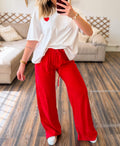 PANTALON ROUGE BRODÉ